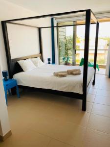 Postel nebo postele na pokoji v ubytování Salgados Apartment - Beach & Pool