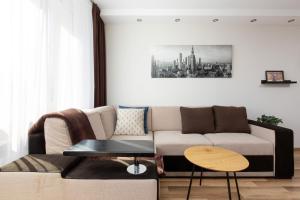 Posezení v ubytování Family Apartment Saska Kępa by Noclegi Renters