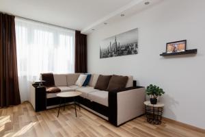 Posezení v ubytování Family Apartment Saska Kępa by Noclegi Renters