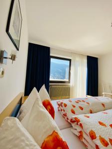 Postel nebo postele na pokoji v ubytování Haus Alpenrose