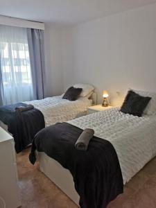 Posteľ alebo postele v izbe v ubytovaní 7 Ocean Point