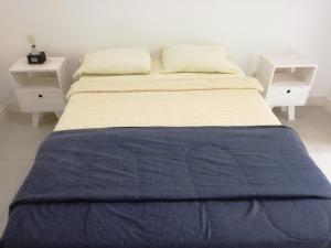 Uma cama ou camas num quarto em MIRADORES DEL TIGRE