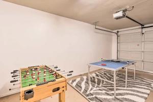 a ping pong table in a room with a chessboard at Modern Villa min walk to Scottsdale W Hotel & City Center in Scottsdale