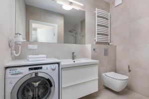 Kúpeľňa v ubytovaní Seaside Apartamenty - Olimpijska 2 Mielno - Sauna & Fitness & Parking - w cenie pobytu