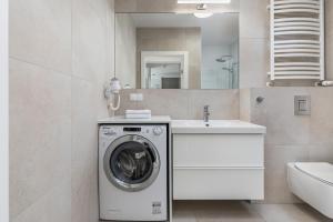 Kúpeľňa v ubytovaní Seaside Apartamenty - Olimpijska 2 Mielno - Sauna & Fitness & Parking - w cenie pobytu