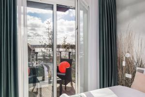Balkón alebo terasa v ubytovaní Seaside Apartamenty - Olimpijska 2 Mielno - Sauna & Fitness & Parking - w cenie pobytu