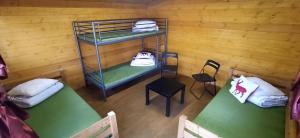 Postel nebo postele na pokoji v ubytování Biržai camping