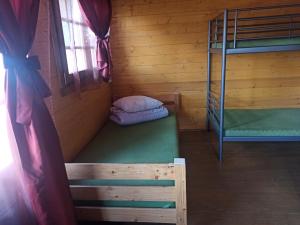 Postel nebo postele na pokoji v ubytování Biržai camping