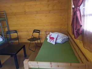Postel nebo postele na pokoji v ubytování Biržai camping