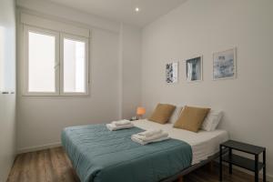 Katil atau katil-katil dalam bilik di Modern, Stylish Apartment
