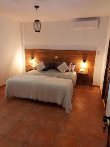 A bed or beds in a room at Casa Loko