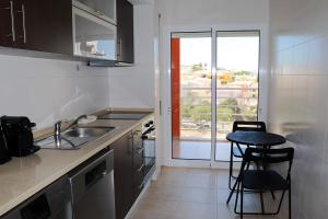Kjøkken eller kjøkkenkrok på Lumina Sereno