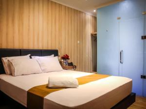 Cama o camas de una habitación en Madu Inn