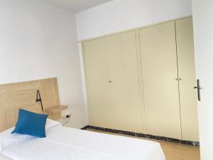 Postel nebo postele na pokoji v ubytování Atico con Terraza