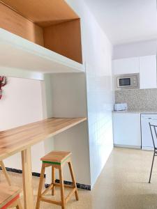 Kuchyň nebo kuchyňský kout v ubytování Atico con Terraza