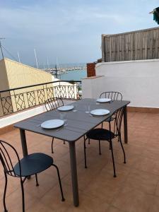 Balkón nebo terasa v ubytování Atico con Terraza