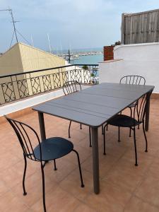 Balkón nebo terasa v ubytování Atico con Terraza