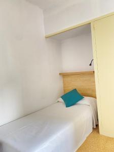 Postel nebo postele na pokoji v ubytování Atico con Terraza