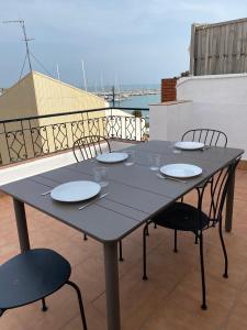 Balkón nebo terasa v ubytování Atico con Terraza