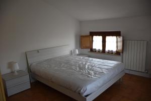 Krevet ili kreveti u jedinici u objektu Appartamento Baia Mare