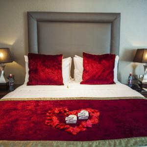 Giường trong phòng chung tại International Hotel Killarney