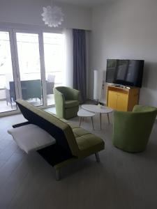 Televízia a/alebo spoločenská miestnosť v ubytovaní *KASTELLINO* FULLY RENOVATED 4Beds/2Bathrooms