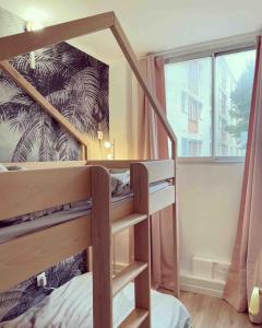 سرير أو أسرّة في غرفة في Superbe Appt vue mer climatisé