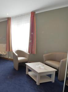 Posezení v ubytování Hotel des Ardennes