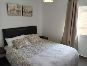 Postel nebo postele na pokoji v ubytování Apartamento Casa Quiles