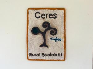a sign that reads cares renal ecologist at el gran sueño Boutique Hotel & Apartamentos - Adults Only in Pintueles +37 photos