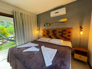 Postel nebo postele na pokoji v ubytování Pousada Villa Dos Sonhos