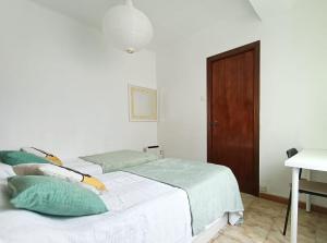 Posteľ alebo postele v izbe v ubytovaní Hawaii Fira Barcelona