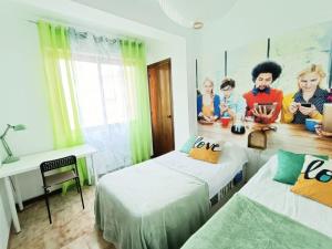 Posteľ alebo postele v izbe v ubytovaní Hawaii Fira Barcelona