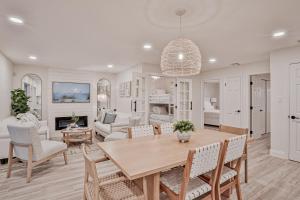 a dining room and living room with a table and chairs at Sunrise Beach Retreat in Flagler Beach