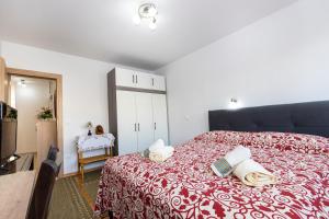 Posteľ alebo postele v izbe v ubytovaní Apartman Ive