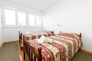 Voodi või voodid majutusasutuse Apartman Ive toas