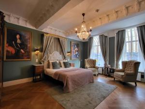 Postel nebo postele na pokoji v ubytování Boutique Hotel Huys van Leyden