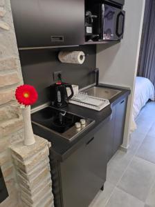 Una cocina o zona de cocina en Rock n Rome - Piazza di Spagna - Via del Babuino