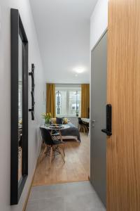 a room with a table and a dining room at Cosy Pepleri place in Tartu