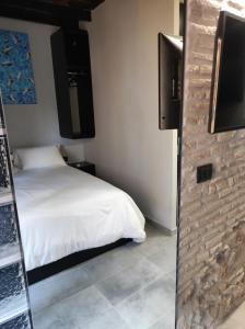 Cama o camas de una habitación en Rock n Rome - Piazza di Spagna - Via del Babuino