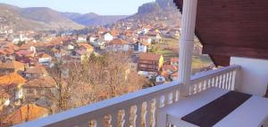 a balcony with a view of a city at VISOKO Room in Visoko