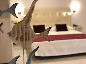 Postel nebo postele na pokoji v ubytování Hotel Océano Centro