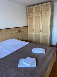 En eller flere senge i et værelse på Belvedere luxury apartment