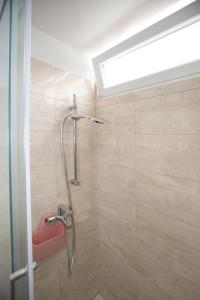 Vannituba majutusasutuses Apartman Ive