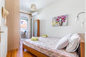 Ένα ή περισσότερα κρεβάτια σε δωμάτιο στο The Nest at Skopelos Town