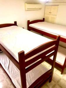 Ein Bett oder Betten in einem Zimmer der Unterkunft APARTAMENTO MELGAR