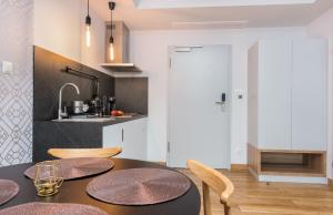 Kuchyň nebo kuchyňský kout v ubytování Apartament Mechelinki + 18 fotografií