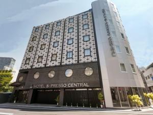a building with a sign on the front of it at Hotel S-Presso Central - Vacation STAY 9451 in Osaka