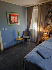 Łóżko lub łóżka w pokoju w obiekcie Pensjonat Klimat Bircza