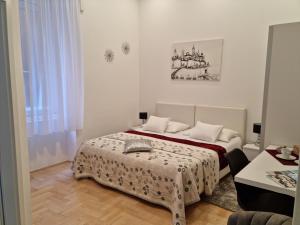 Postel nebo postele na pokoji v ubytování Rooms Tisa Old Town
